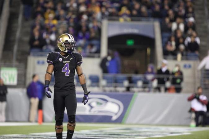 Jaydon Mickens poses for Husky Nation after a touchdown in 2012.
